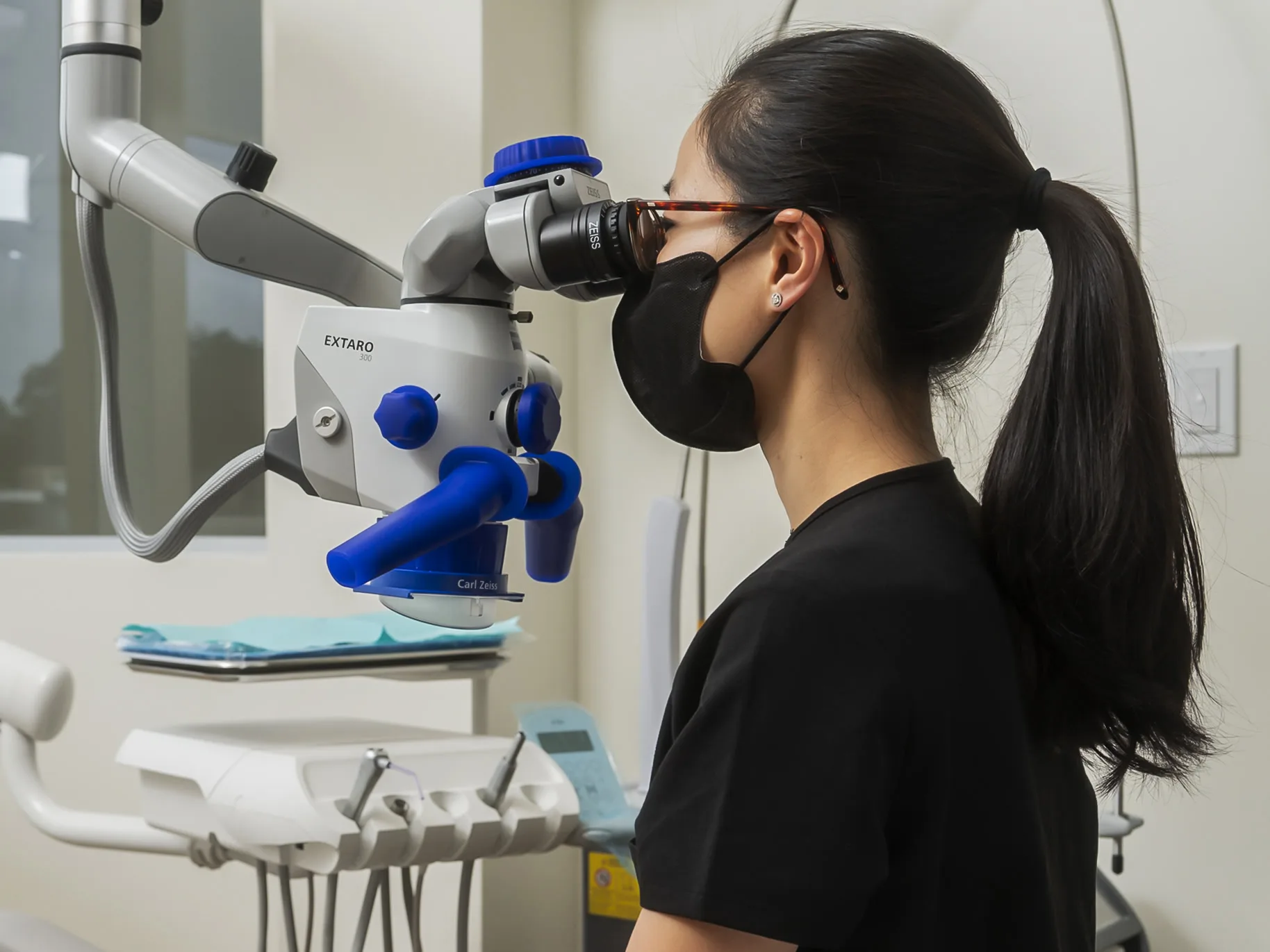 Dr. Leong working under the operating microscope