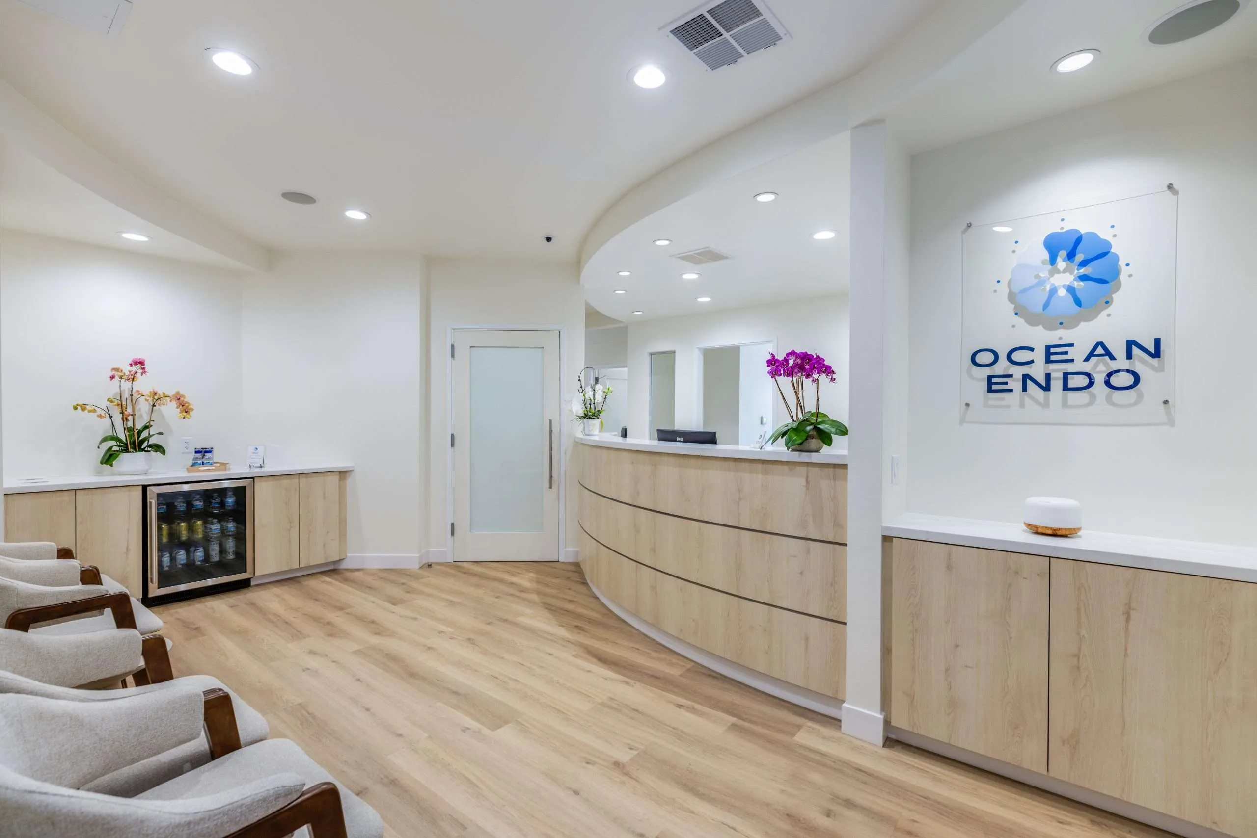 The reception lounge with orchids at Ocean Endodontics