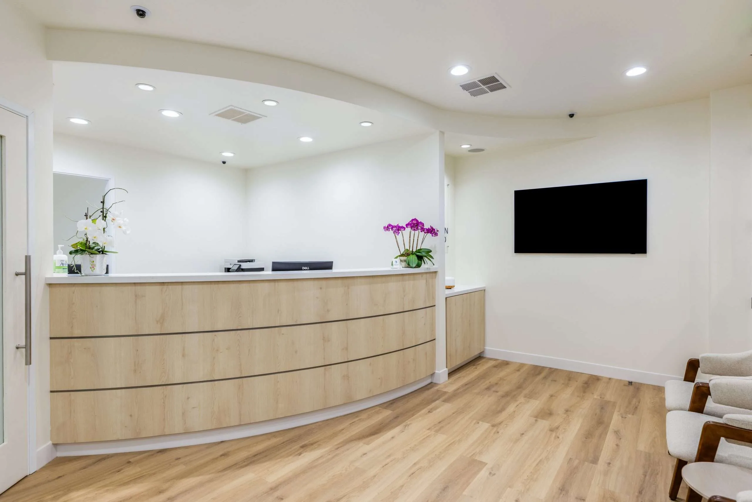 The front desk with fresh orchids