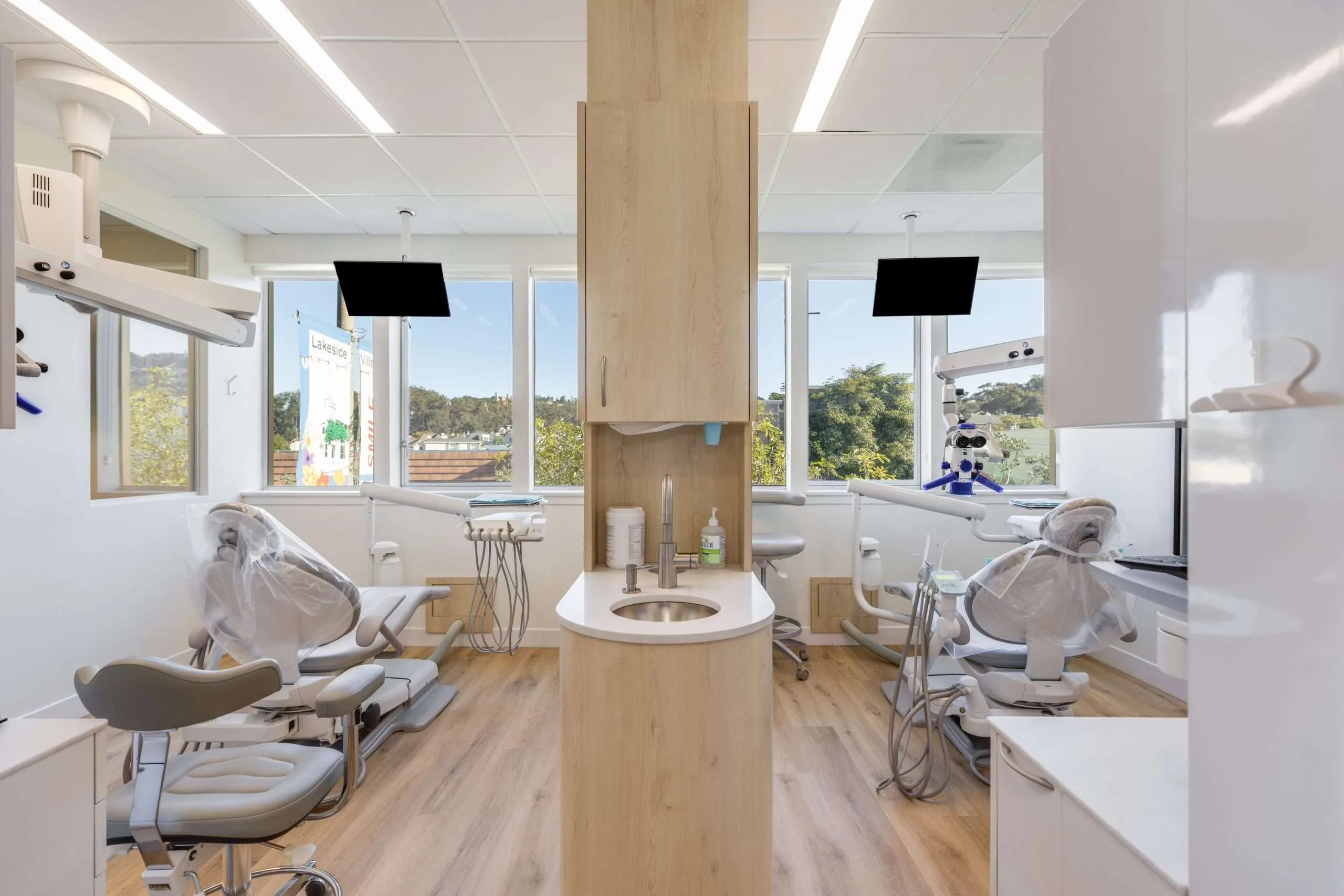 An airy treatment room with warm wood accents