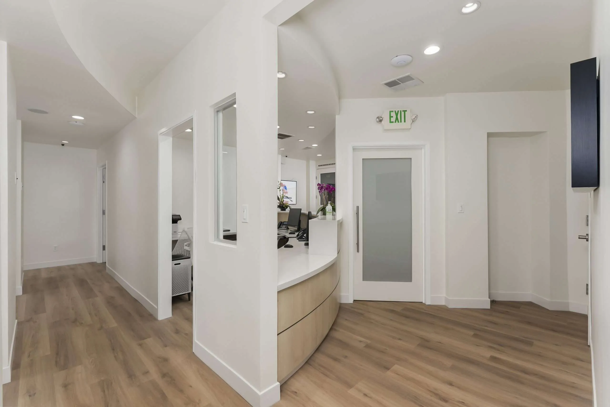 A bright, calm treatment room with large windows